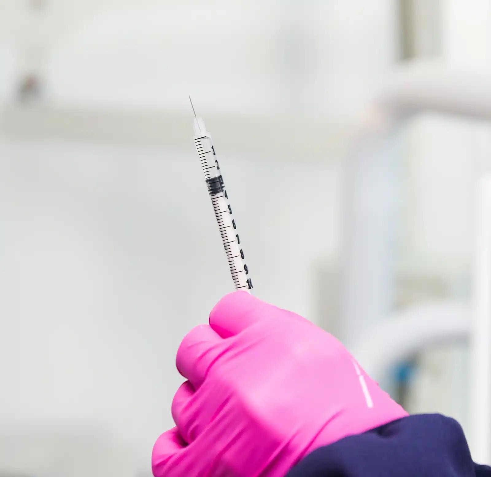 woman holding needle