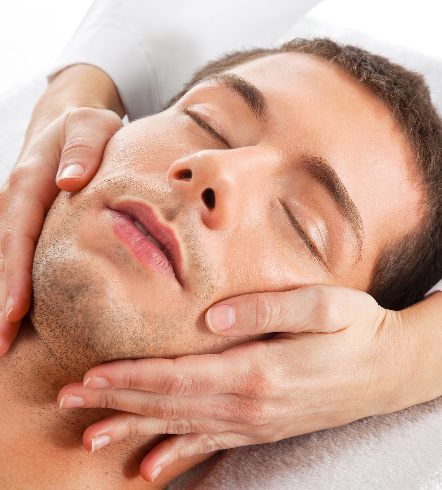 man receiving facial